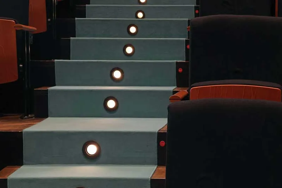 The illuminated steps in the Chamber Music Hall lead upwards and symbolise the various levels or titles that can be achieved as a patron.